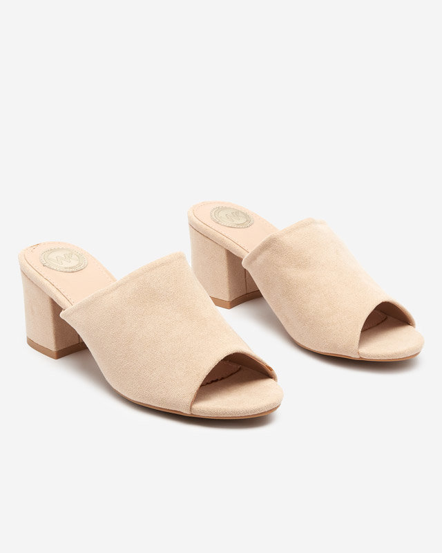 Beige women's slippers on a low post Opetik - Footwear