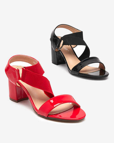 Black lacquered women's sandals on the Wopala post - Footwear