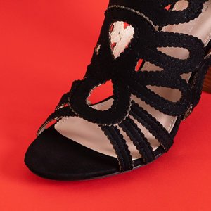 Black sandals with cutouts on a higher post Xiss - Footwear