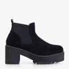 Black women's boots on the post Ovidia - Footwear