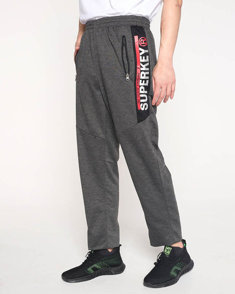 Dark gray men's sweatpants with inscriptions - Clothing