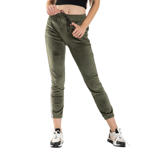 Green velor women's sweatpants with stripes - Clothing