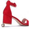 Red sandals on a post Madeleine - Footwear