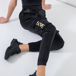 Women's black sweatpants with gold inscriptions - Clothing