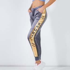 Women's gray sweatpants with gold stripes - Clothing